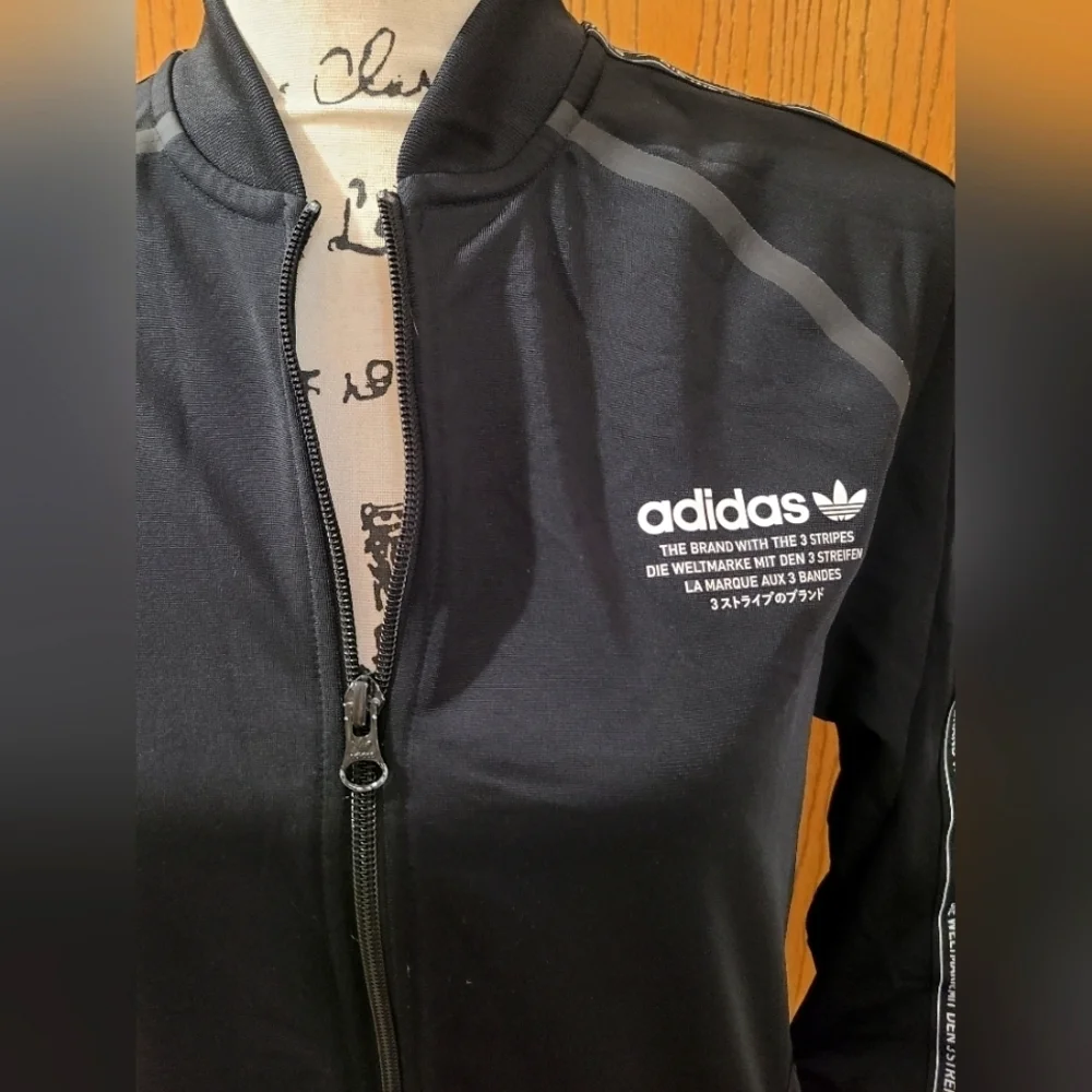 Adidas The Brand with the 3 Stripes logo tape zip up streetwear track jacket